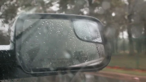 Sideview car mirror in traffic Stock Footage 81221583