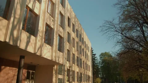 Sideview of modernism style building with columns in dawn with clear sky on the Stock Footage 135057551