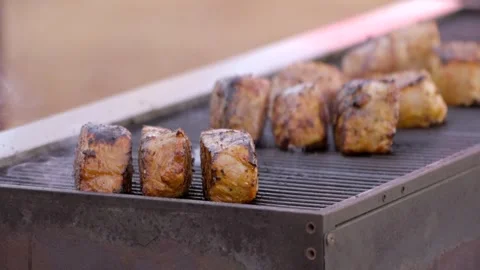 Sideview thick steaks cooked on commercial grill Stock Footage 253517085