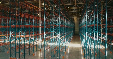 Sideview of warehouse constructions. Sun reflections on metal. Rows of metallic Stock Footage 135058342