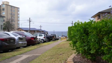 A sidewalk along a car parking. Stock Footage 130368053
