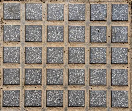 Sidewalk background. Gray squared tiles. Stock Photos
