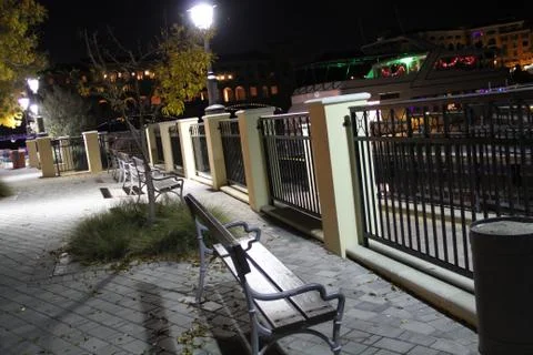 Sidewalk bench at night Foto stock