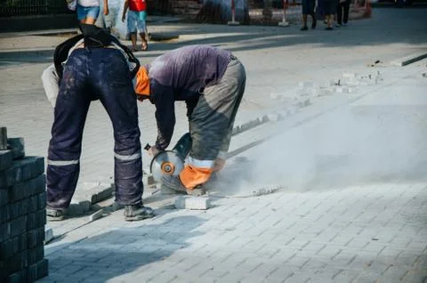 Sidewalk builder Stock Photos