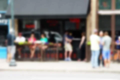Sidewalk cafe blurred Stock Photos