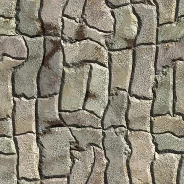 Sidewalk to the city with irregular bricks Stock Photos