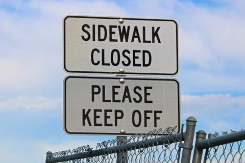Sidewalk closed, Please keep off signs Stock Photos
