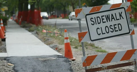 Sidewalk Closed Sign with Sidewalk Stock Footage 65730552