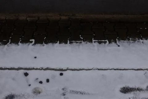 Sidewalk covered by snow Stock Photos