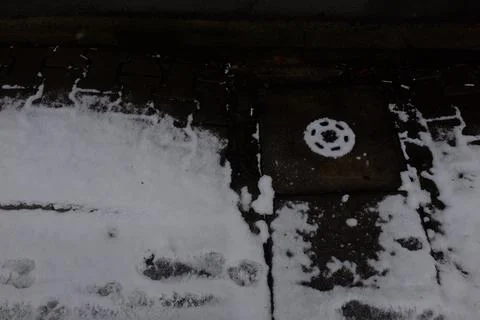 Sidewalk covered by snow Stock Photos
