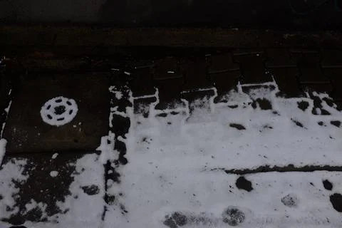 Sidewalk covered by snow Stock Photos