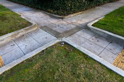 Sidewalk crossroads Stock Photos