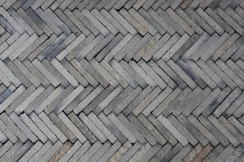 Sidewalk flooring zig zag designed  by bricks background Stock Photos