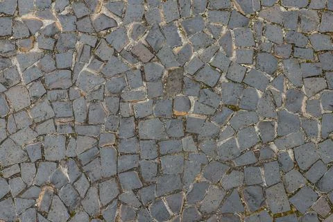 Sidewalk made with Petit-pave (small pavement) Stock Photos