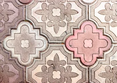 Sidewalk paved with rectangular red, white and gray tiles in perspective Stock Photos