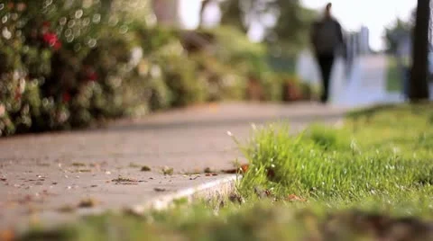 Sidewalk Person Walks By Stock Footage 10910398