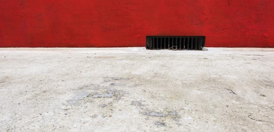 Sidewalk street gutter. Stock Photos