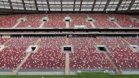 Sideward drone flight across stadium seating rows Stock Footage 322933545