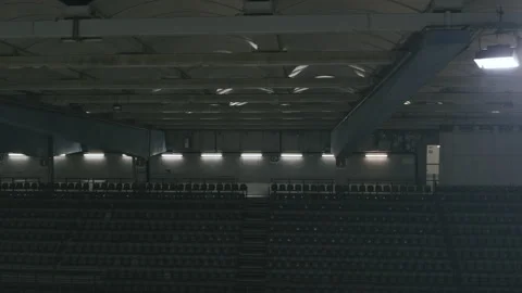 Sideway travel passing spotlights, empty grandstands 스톡 동영상 134572285