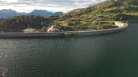 Sideways Aerial Flight Along Diga di Cavia Reservoir Stock Footage 336932311