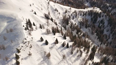 Sideways Aerial Flight Over Snowy Ravine at Lastoi de Formin Stock Footage 337067132