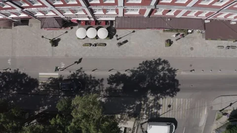 Sideways drone flight above urban road top view Video stock 331740898