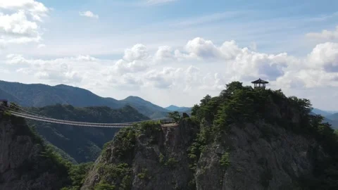 Sideways Drone Flight Along Mountain Suspension Bridge at Gubongsan, Korea Stock Footage 343193747