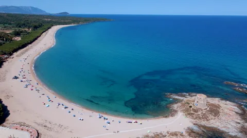 Sideways Drone Flight Along Torre di Bari Sardo Beach – Sardinia and Tower Stock Footage 313548832