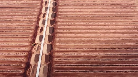 Sideways drone flight of industrial peat field geometry and extraction patterns Stock Footage 341521907