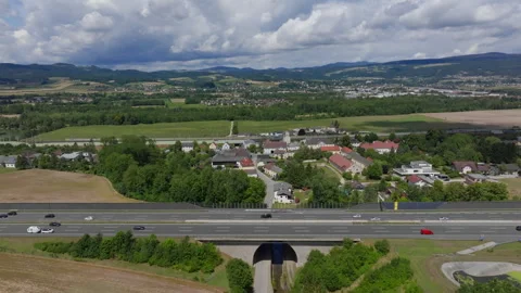 Sideways drone flight over Austrian autobahn from left to right Stock Footage 264074570