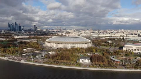 Sideways drone flight over city stadium and river Stock-Footage 323765048