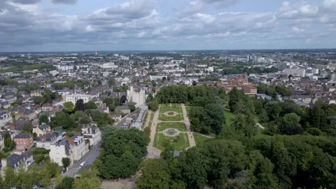 Sideways drone movement above the Parc du Thabor spiral garden and its closest Stockbeeldmateriaal 295755973