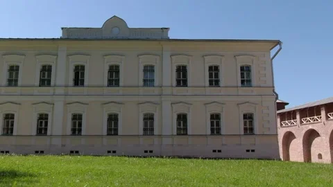 Sideways drone shot of historic facade and wall 動画素材 332094019