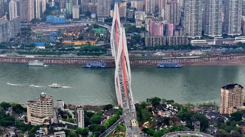 Sideways Drone View of Traffic on Dongshuimen Yangtze River Bridge in Chongqing Stock Footage 339747393