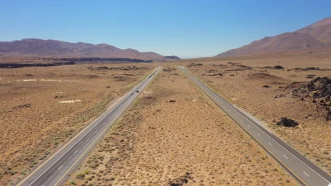 Sideways flight over a desert highway 2 Stock Footage 142786291