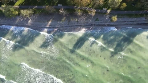 Sideways flyover the coast of Visby Stock Footage 300106105