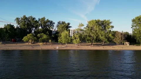 Sideways Parallel Aerial View of Beach Park Stock Footage 280415351