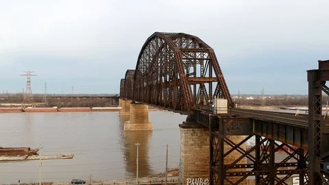 Sideways shot over vintage train bridge over the Mississippi river Stock Footage 104876150