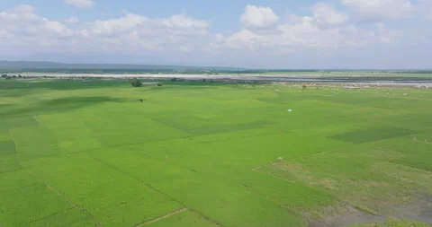 Sideways tracking drone shot over Koshi Nepal showing two drones flying above Stock Footage 337393127