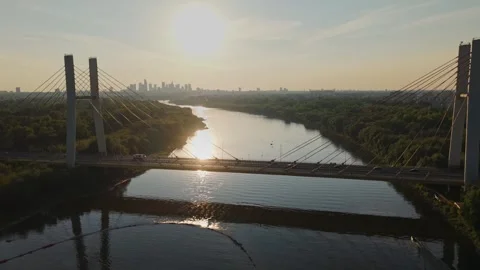 Siekierkowski bridge over Vistula river, on which cars move on a sunny day. Stock Footage 314050904