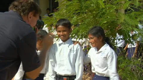 Siem reap cambodia school children in elementary school grades 3 thru 8 pose Stock Footage
