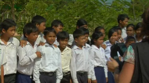 Siem reap cambodia school children in elementary school grades 3 thru 8 posin Stock Footage