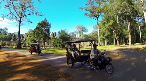 SIEM REAP - Traffic on the junction  in front of Bayon temple. Stock Footage 46275848