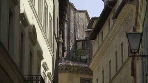 Siena Back Streets Handheld 4K Stock Footage 76681263