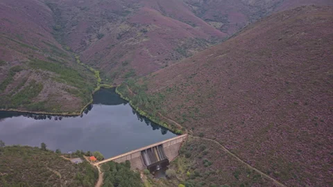 Sierra de Gata Dam Orbit Over Reservoir and Heather Hills, Extremadura Stock Footage 335278120