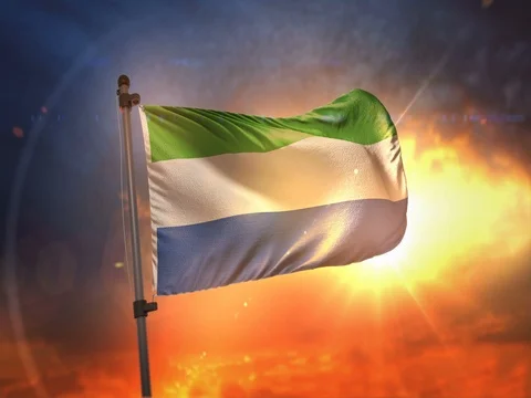 Sierra Leone Flag Backlit At Beautiful Sunrise Loop Slow Motion 4K Stock Footage 76814905