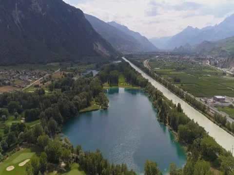Sierre golf, Breche lake, part 2 - Aerial 4K - Phantom 4 PRO Stock Footage 79393702