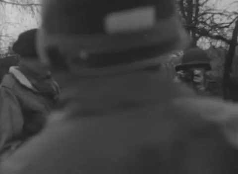 SIERSDORF - 1945: Command post visit - Officers walk beside open vehicle Vídeo Stock 343848747