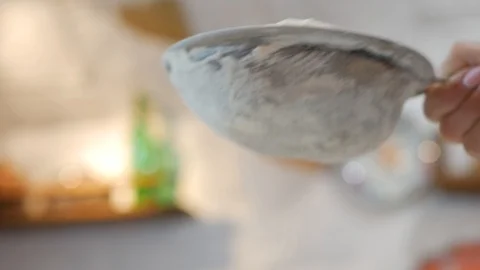 Sieve Flour Cook in the kitchen Stock Footage 87347446
