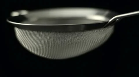 Sieving flour Stock Footage 12601560